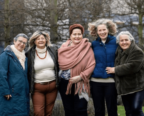 Group picture of 5 ladies, photographed outside
